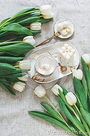 Breakfast in bed, cup of cappuccino, flowers Stock Photo