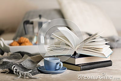 Breakfast in bed. On a white tray there is a coffee maker, coffee blue cup and croissants Stock Photo