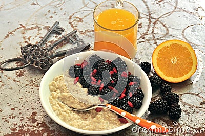 Breakfast with blackberries ,goji seeds and orange juice Stock Photo