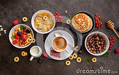 Breakfast cereals, pancakes, fresh berries and cup of coffee Stock Photo