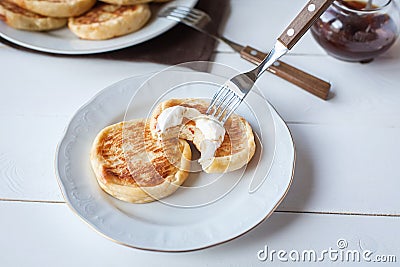 Breakfast with cheese pancakes, coffee and jam Stock Photo