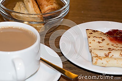 Breakfast, coffee, pancake with jam Stock Photo