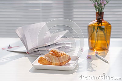 Breakfast. Croissant cake in the morning, relaxing time Stock Photo