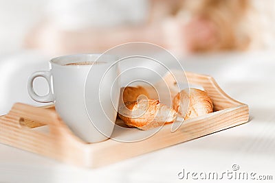 Breakfast with cup of black coffee and croissants Stock Photo