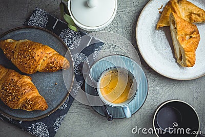 Breakfast - cup of coffee, croissants and curd cheese turnover Stock Photo