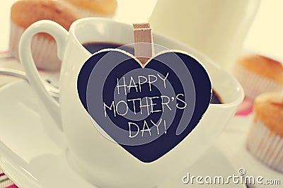 breakfast and happy mothers day written in a heart-shaped blackboard Stock Photo