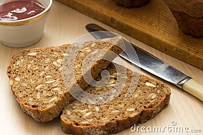 Breakfast with healthy brown bread and preserved jam Stock Photo