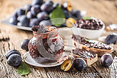 Breakfast from homemade plum jam bread and ripe plums. Stock Photo