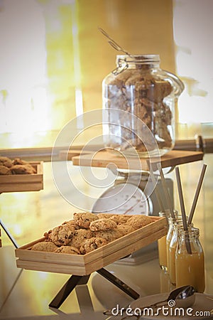 Breakfast in hotel loby, cookies with juice Stock Photo