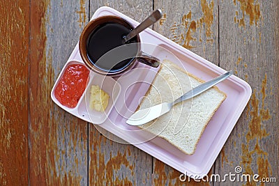 Breakfast meal with coffee slice toast and strawberry jam Stock Photo