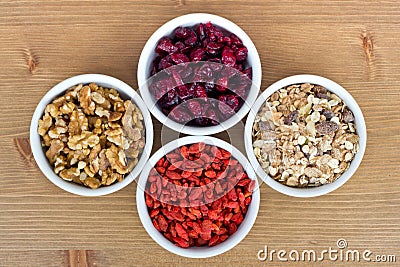 Breakfast muesli, goji berries, walnuts, berries Stock Photo