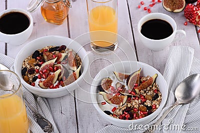 Breakfast. Muesli with oatmeal, figs and dried fruits Stock Photo