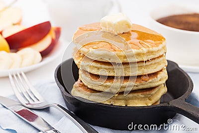 Breakfast with pancakes, honey and fruits Stock Photo