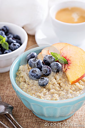 Breakfast quinoa porridge with fresh fruits Stock Photo