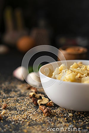 breakfast with Roasted cauliflower salad with assorted nuts in bowl and vegetables and eggs s Stock Photo