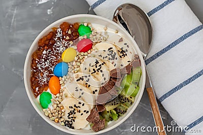 Breakfast smoothie bowl topped with chocolate Stock Photo