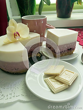 Breakfast on the table: coffee, cheesecake and white chocolate Stock Photo