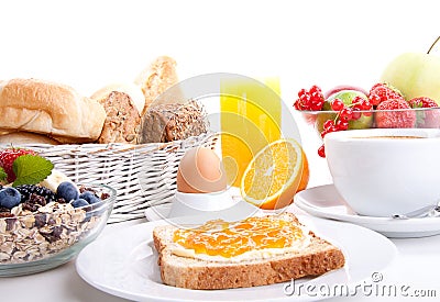 Breakfast table with toast and orange marmelade Stock Photo
