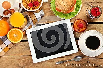 Breakfast and tablet Stock Photo