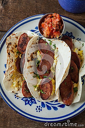 Breakfast tacos with kielbasa sausage tacos, eggs and cilanro Stock Photo