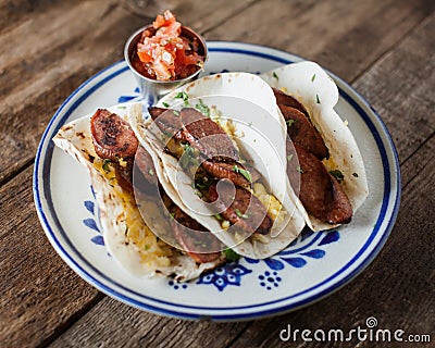 Breakfast tacos with kielbasa sausage tacos, eggs and cilanro Stock Photo