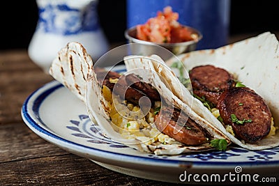 Breakfast tacos with kielbasa sausage tacos, eggs and cilanro Stock Photo