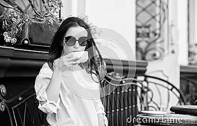 Breakfast time in cafe. Girl enjoy morning coffee. Woman drink coffee outdoors. Peaceful inspiring moment. Girl relax in Stock Photo
