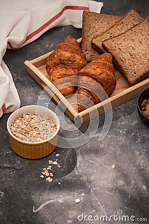 Breakfast with toast and croissant. milk in a glass bottle. Good start to the day. Good morning Stock Photo