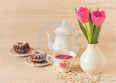 Breakfast vintage easter table decoration with mini bundt cake Stock Photo