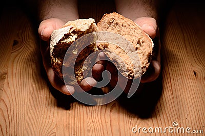 Breaking bread Stock Photo