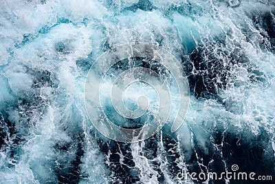 Breaking turquoise wave, splashing water drops, very sharp Stock Photo