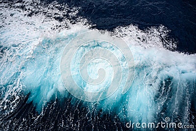 Breaking turquoise wave, splashing water drops, very sharp Stock Photo