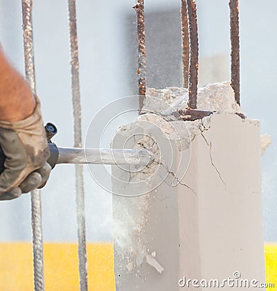 Breaking reinforced concrete with jackhammer Stock Photo