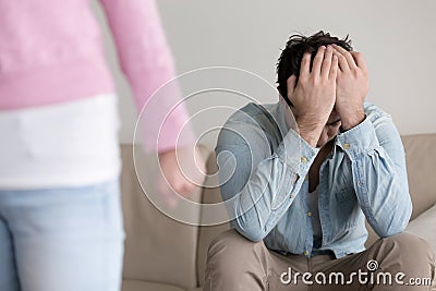 Breaking up, woman leaving, upset abandoned boyfriend, ending re Stock Photo