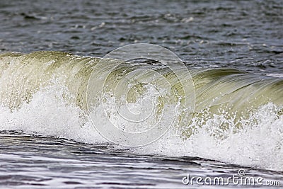 Breaking wave action. Force of nature providing renewable energy Stock Photo