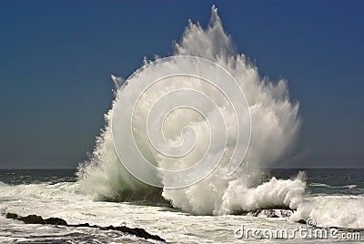 Breaking wave on ocean beach Stock Photo