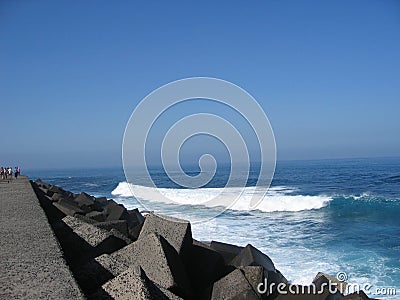 Breakwater with rock cubes in Spain Stock Photo