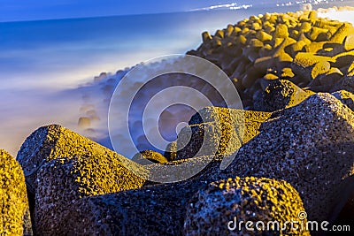 Breakwater in the port Stock Photo