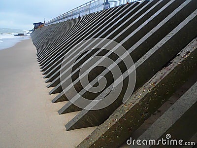 The breakwater stretching into the future on sea Stock Photo