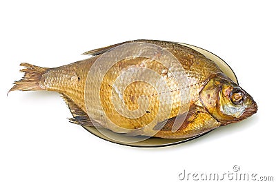 Bream fish smoked on a plate on a white background Stock Photo