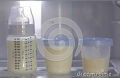 Breast milk storage stored in the back of the refrigerator Stock Photo