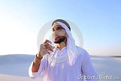 Breath of freshness of male Muslim in middle of dry climate of s Stock Photo