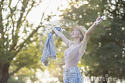 Breathing fresh air , young woman enjoying relaxing,Feeling alive Stock Photo