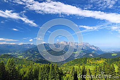 Breathtaking lansdcape of mountains, forests and small Bavarian villages in the distance. Scenic view of Bavarian Alps with majest Stock Photo