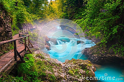 Breathtaking Radovna river in Vintgar gorge and wooden footbridge, Slovenia Stock Photo