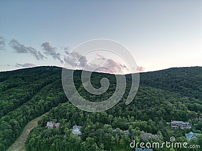 Breathtaking scenery of the sunset on forest hills in Ludlow Vermont Stock Photo