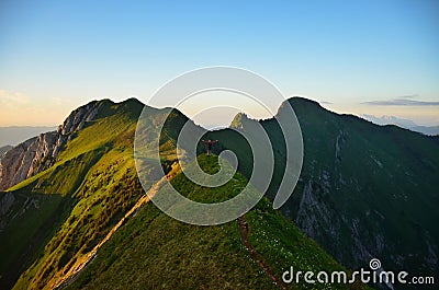Breathtaking sunset in the mountains. View of the Bockmattli Innerthal and Lake Zurich. Hiking in Switzerland. Glarus Stock Photo