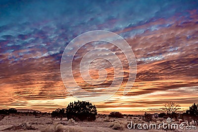 Breathtaking sunset over a field in Santa Fe, New Mexico Stock Photo