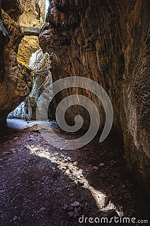 Breathtaking view of the narrow path between the enormous rocks Stock Photo
