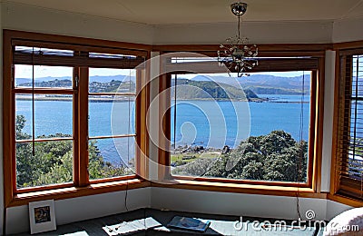 Breathtaking view over Lyall Bay and Wellington Airport through a picture window Editorial Stock Photo